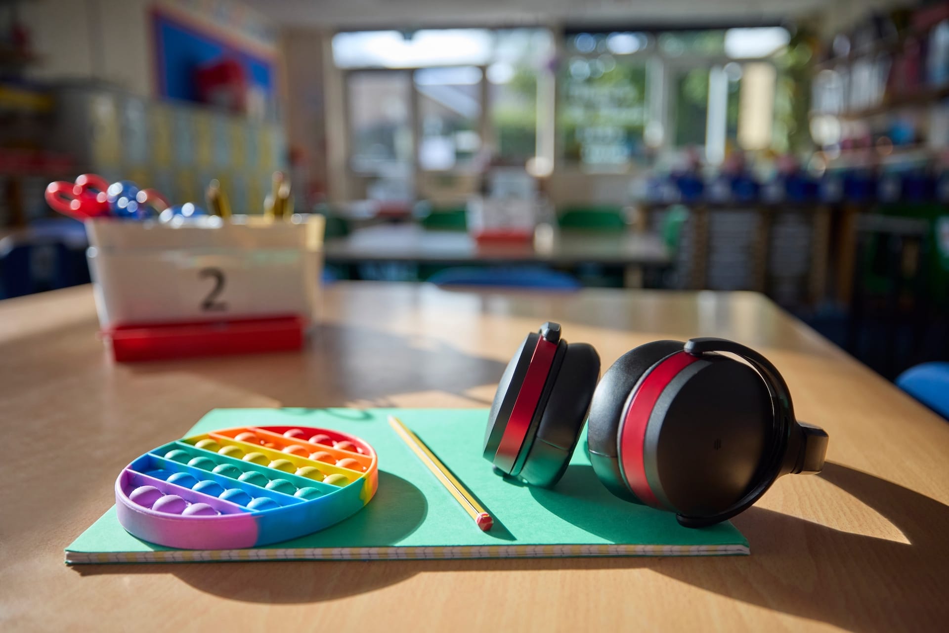 Ear protection and fidget tools in a grade school classroom.